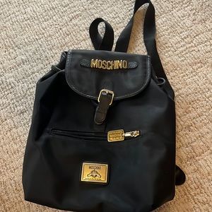 Vintage Moschino Black and Gold Nylon Backpack.